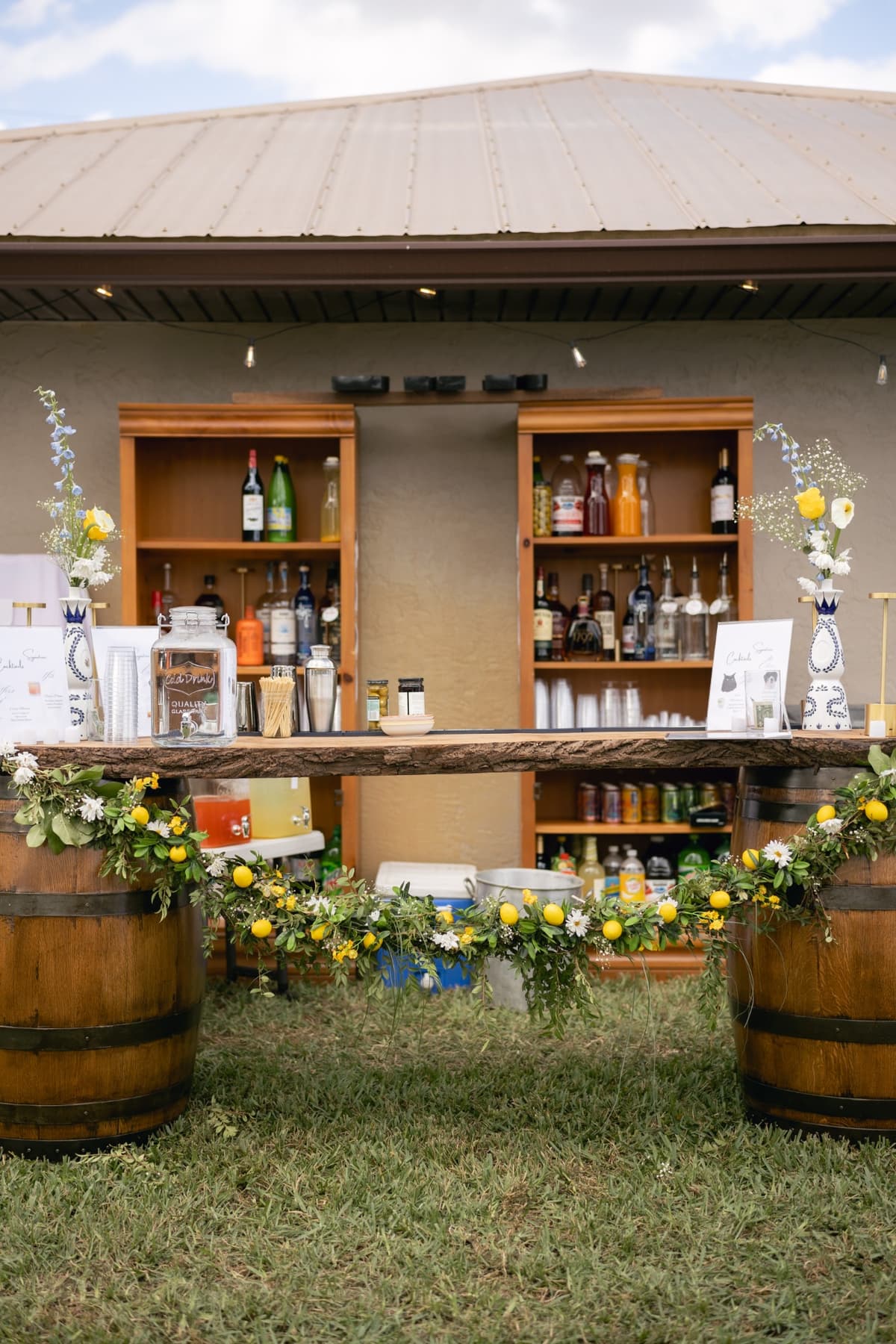 Solid oak bar top across whiskey barrels