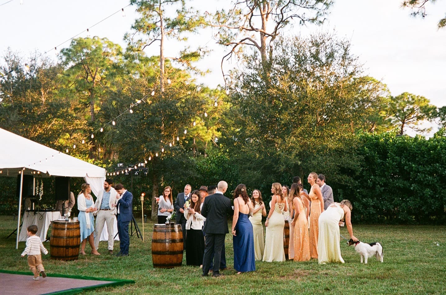Outdoor cocktail hour with whiskey barrels